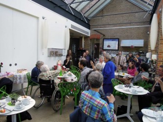 Guests toast Karen after Edward Maeder’s speech at Karen’s 94th birthday party