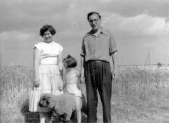 Karen, Katrina and Norman with Gingo the lamb in Meldgaard, c. 1954