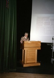Karen giving a lecture at a textile conference