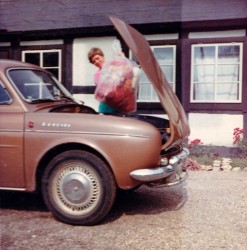 Eva-Louise loading the car with materials