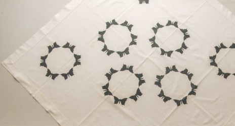 Screen printed tablecloth made by Karen, with black butterflies on black cloth